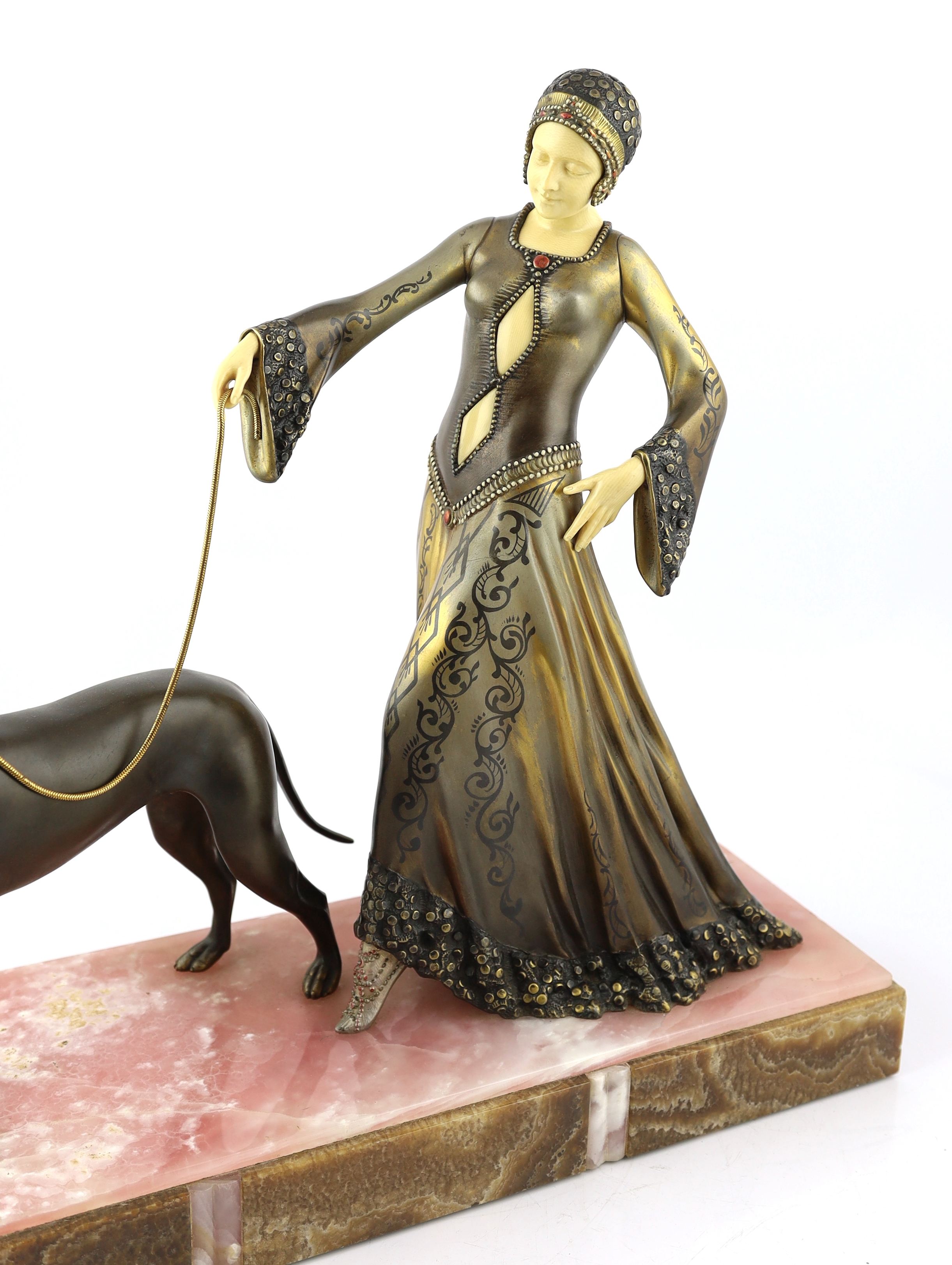 G. Gori, a French Art Deco bronze, simulated ivory and marble Art Deco group of a medieval lady with a hound, 56cm wide, 20cm deep, 52cm high